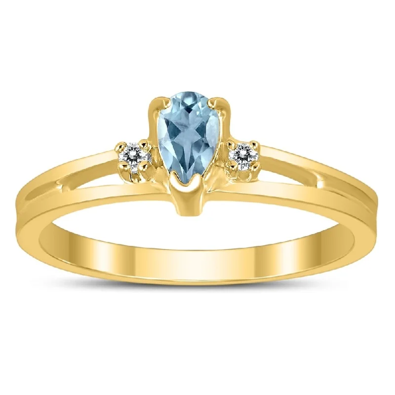 5X3MM Aquamarine and Diamond Pear Shaped Open Three Stone Ring in 10K Yellow Gold