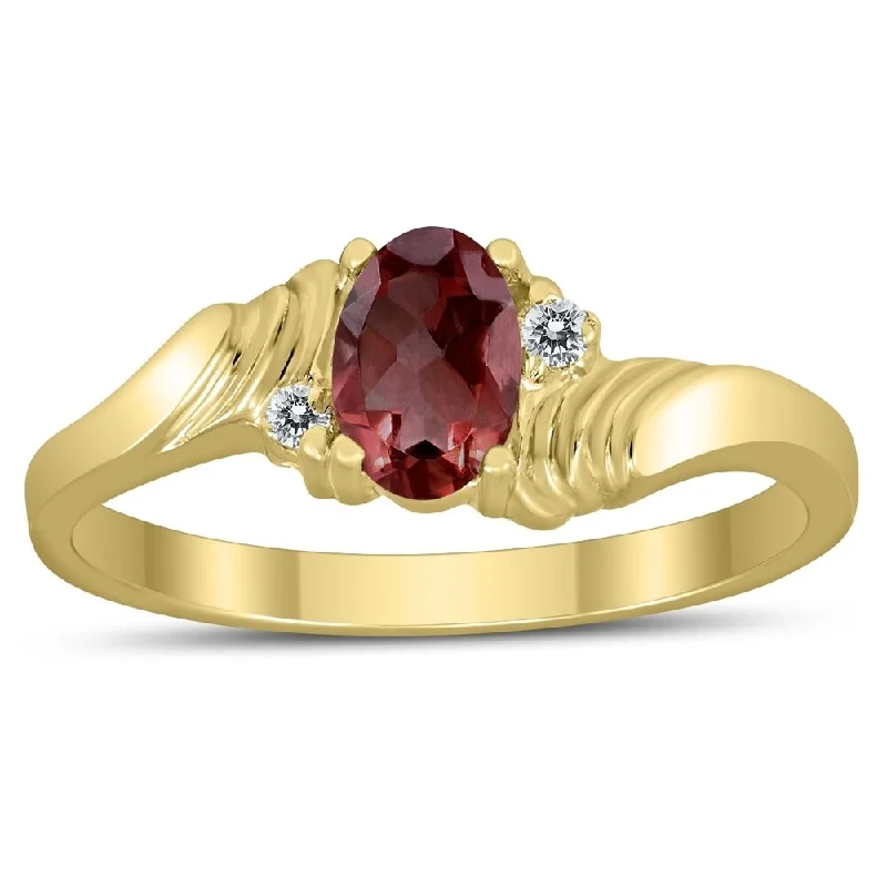 6X4MM Garnet and Diamond Wave Ring in 10K Yellow Gold