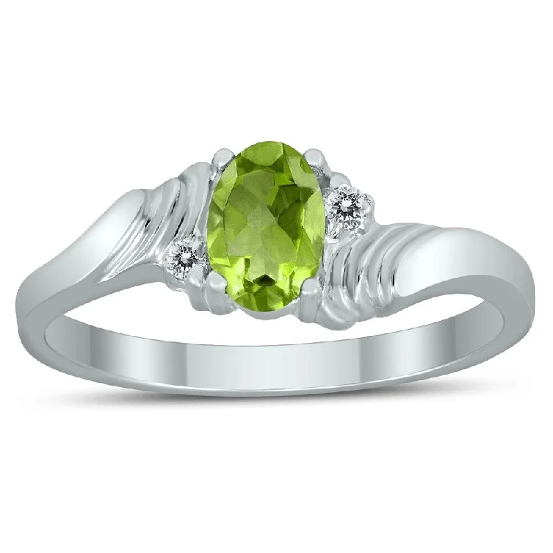 6X4MM Peridot and Diamond Wave Ring in 10K White Gold