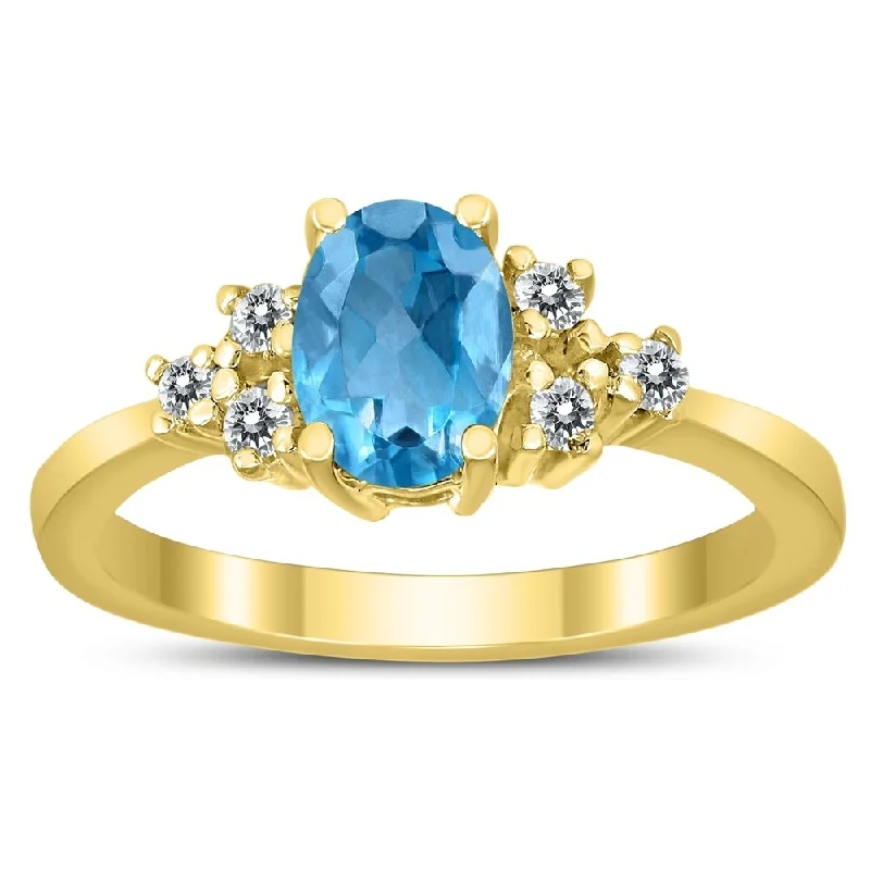 7X5MM Blue Topaz and Diamond Regal Ring in 10K Yellow Gold