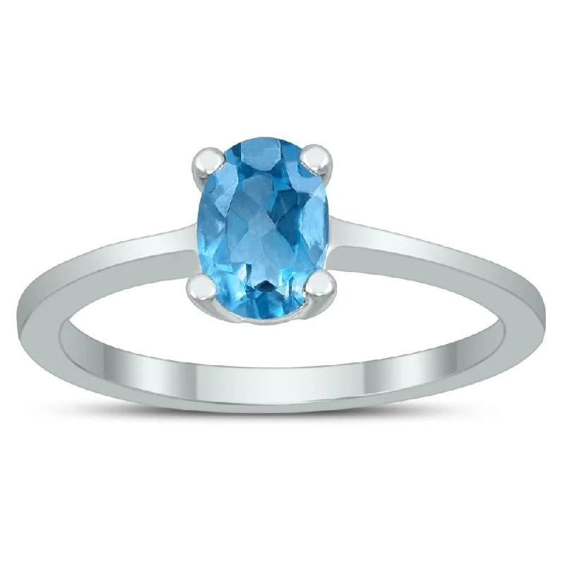 Oval Solitaire 7X5MM Blue Topaz Ring in 10K White Gold