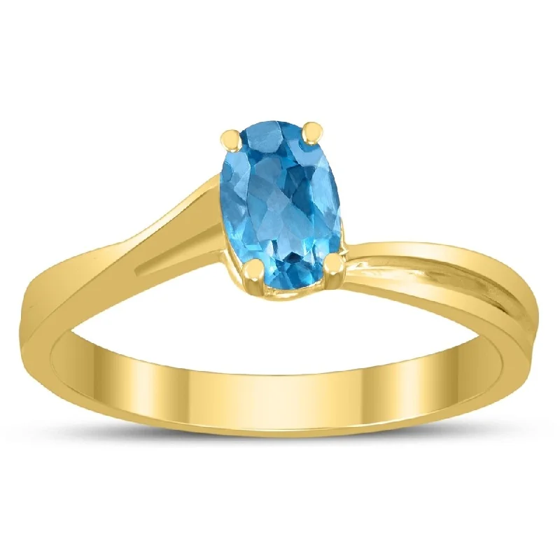 Solitaire Oval 6X4MM Blue Topaz Gemstone Twist Ring in 10K Yellow Gold