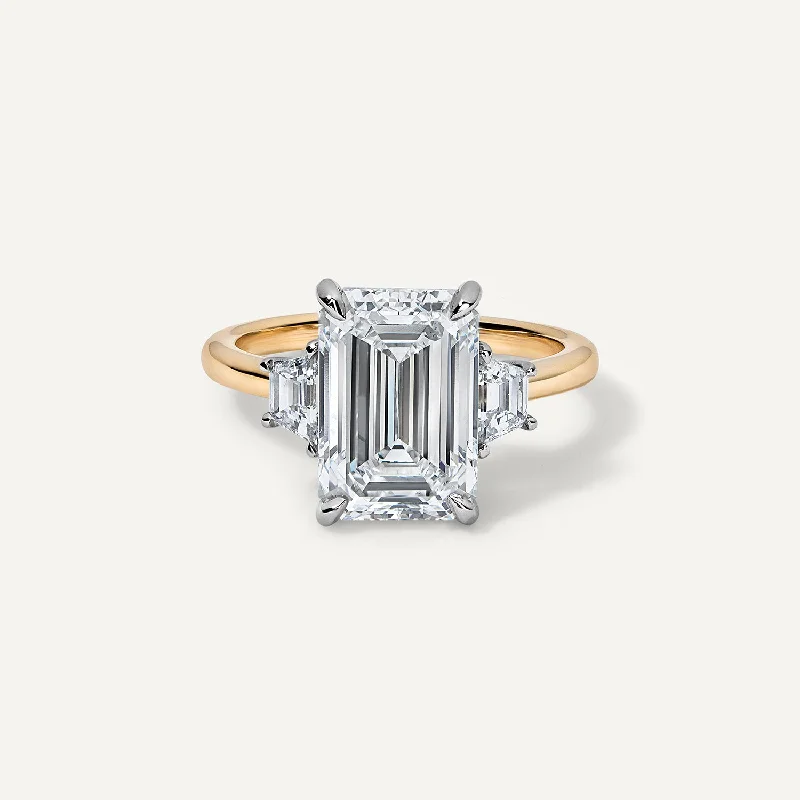 Three Stone Emerald Cut with Step Cut Trapezoids